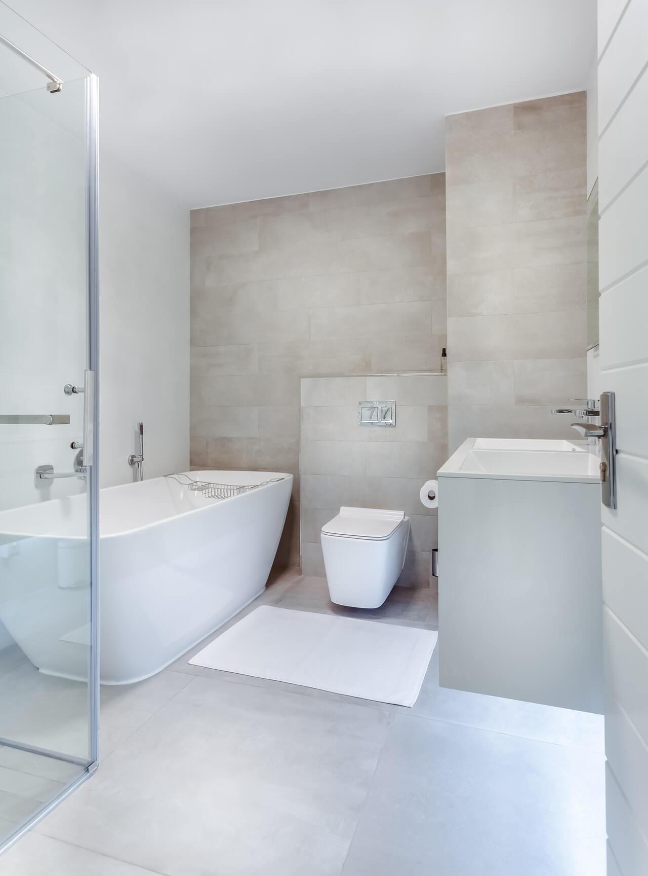 A bathtub in a hotel.