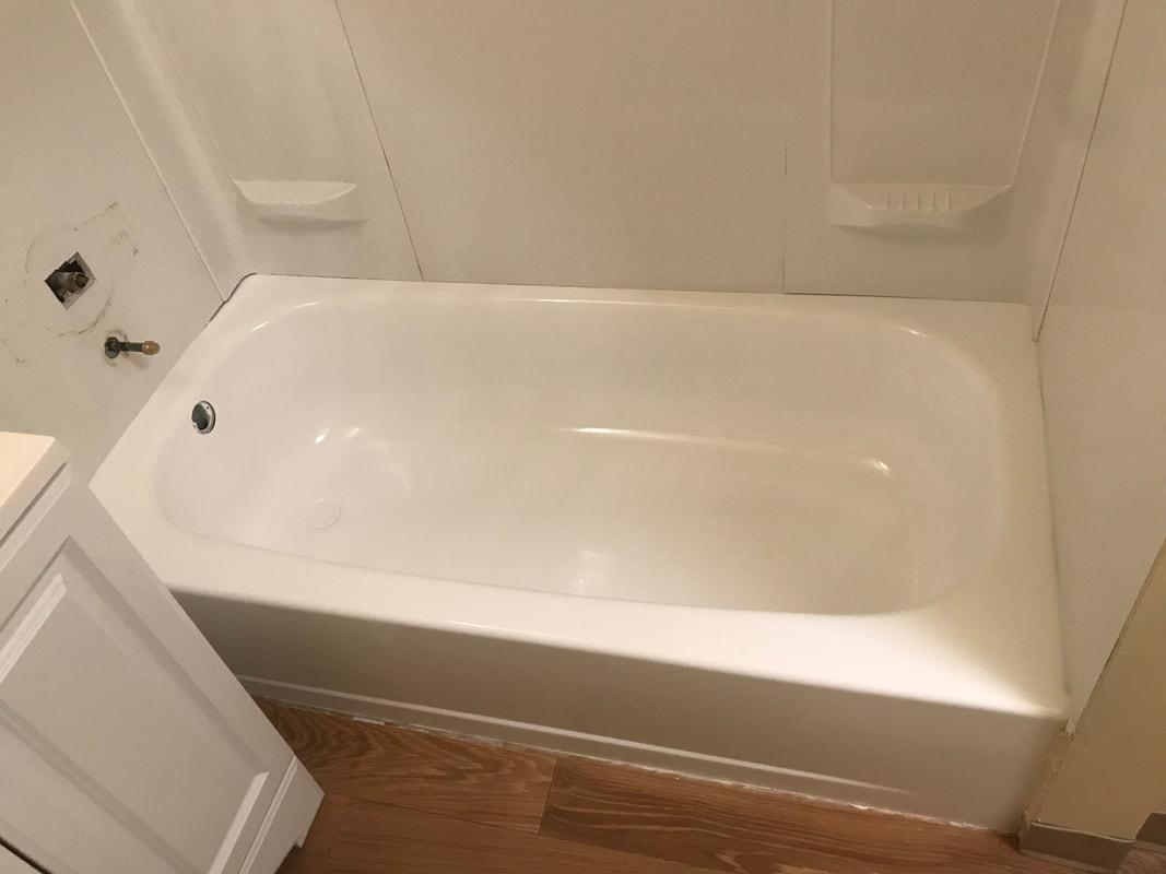 A bathtub in someone's home.